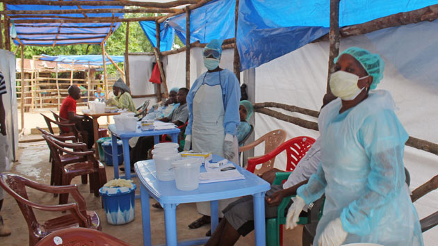 Health workers in Sierra Leone at a clinic for Ebola patients Youssouf Bah/AP